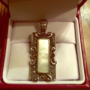 Stamped sterling silver pendant w/ Mother of pearl